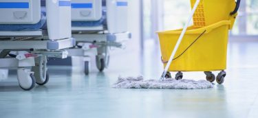stock-photo-cleaning-the-patient-room-in-a-modern-hospital-cleaner-hospital-cleaning-1445365493-transformed